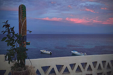 Decorative housing of the climate sensor. Indonesian mask